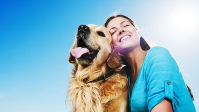 Happy-Woman-With-Dog